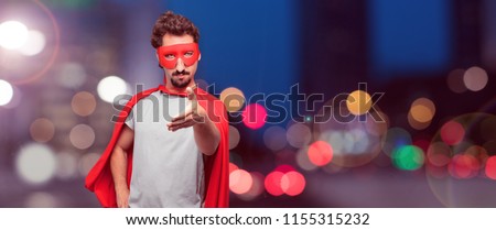 crazy man as a super hero with a serious, confident, proud and stern expression offering a handshake, closing a deal, or greeting and welcoming you.