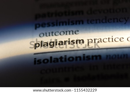 plagiarism word in a dictionary. plagiarism concept. Royalty-Free Stock Photo #1155432229