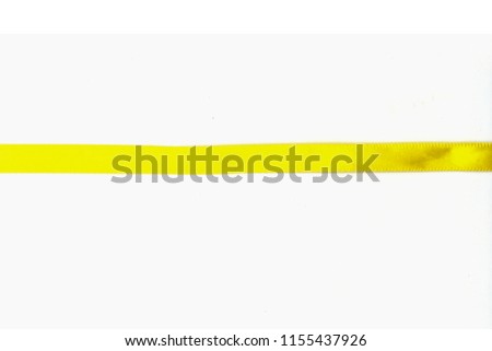 Yellow ribbon with bow isolated on white background.