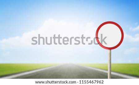 Blank road sign or White traffic sign on blurred asphalt road with colorful light background. Transport Concept
