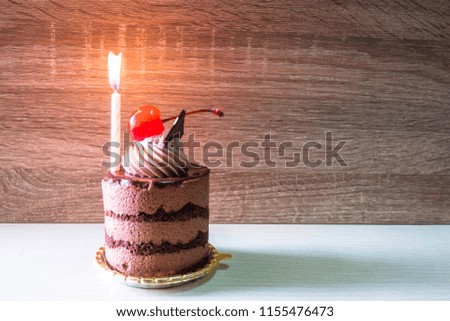 Smooth chocolate cake in birthday
