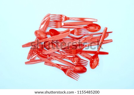 A studio photo of plastic cutlery