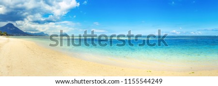Sandy tropical Wolmar beach at sunny day. Beautiful landscape. Panorama. Mauritius