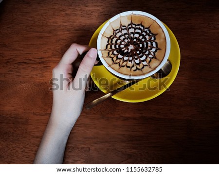 Pattern​ on​ cappuccino coffee​