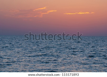 Bright sunset under the sea with yellow red gradient colors