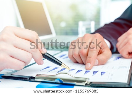 Business couple working in office