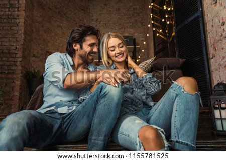 Couple at home - Young adults flirting and having a nice time at home