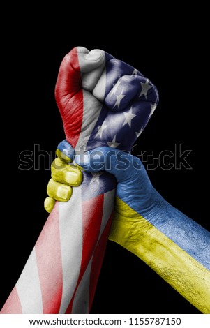AMERICAN VS Ukraine, Fist painted in colors of Ukraine flag, fist flag, country of Ukraine