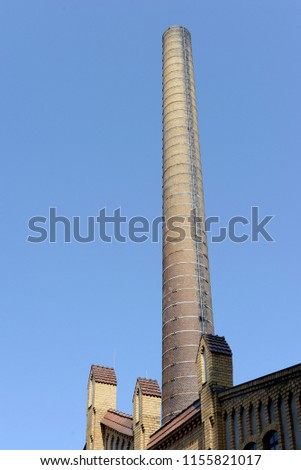   old chimney against blue sky