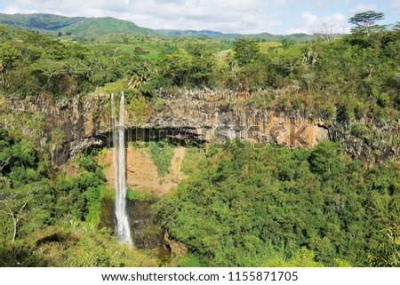 Beautiful landscape of Chamarel Waterfall in the tropical jungle of Mauritius island.
