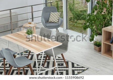 Stylish dining room interior. Home design idea