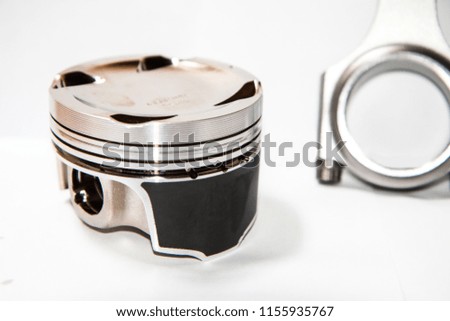 A picture of the light forged sport and racing piston and connecting rod. Isolated on white background. 