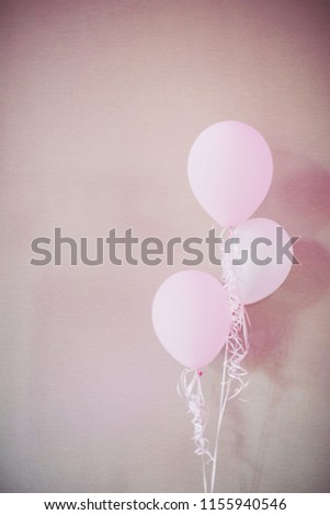 Pretty pink 3 balloons on plain background