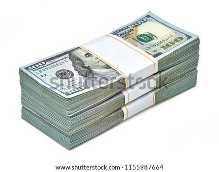 
Creative business finance making money concept or stack of bundles of new design 100 US dollars 2018 edition banknotes or bills isolated on white background