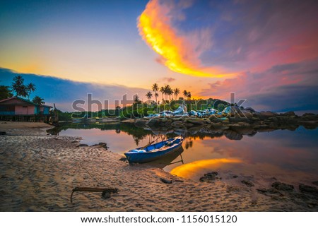
Beautiful sunset in the fishing village of Bintan Island Royalty-Free Stock Photo #1156015120