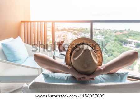 Relaxation healthy living lifestyle summer holiday vacation of freelancer woman take it easy resting in comfort chair in resort hotel balcony having peace of mind and self health quality balance Royalty-Free Stock Photo #1156037005