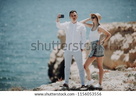 couple taking selfie self portrait photo romantic. Happy lovers, woman and man traveling on vacation