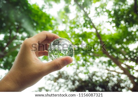 background green nature.Love the world.light bokeh.Crystal ball. Royalty-Free Stock Photo #1156087321