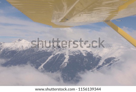 Smal Airplane Flying over the Bariloche Mountain Landscape. Patagonia, Argentina. 