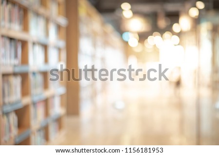 Abstract blurred empty college library interior space. Blurry classroom with bookshelves by defocused effect. use for background or backdrop in book shop business or education resources concepts