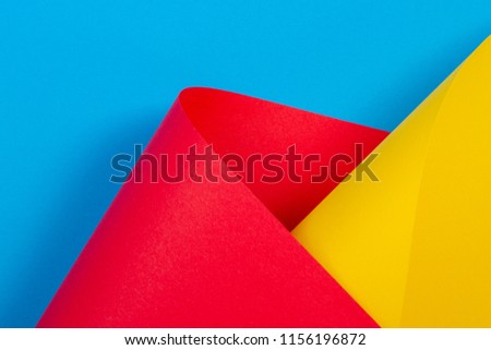 Abstract colorful background. Yellow red blue color paper in geometric shapes