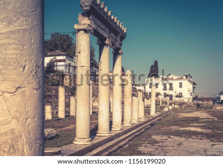 Panorama of the Roman Agora in summer, Athens, Greece. It is one of the main tourist attractions of Athens. Scenery of ancient Greek ruins in Athens center near Plaka district. Vintage style photo.