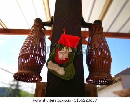 Christmas stocking and Traditional Malay fishing trap call Bubu hold in wall for decoration