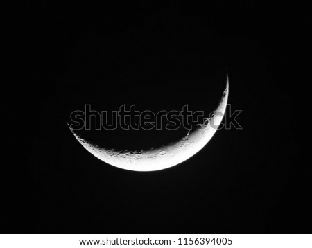 Crescent moon background / A crescent shape is a symbol or emblem used to represent the lunar phase in the first quarter