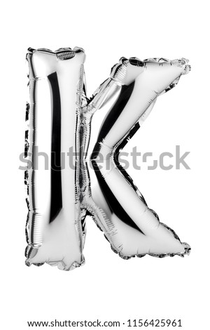 Letter K of silver balloon isolated on white background