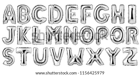 English alphabet from silver balloons isolated on white background Royalty-Free Stock Photo #1156425979