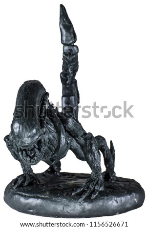 Sculpture of space monster alien.hand made model from plasticine.
