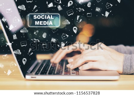 Hands using laptop with social media sketch. Communication and online concept 