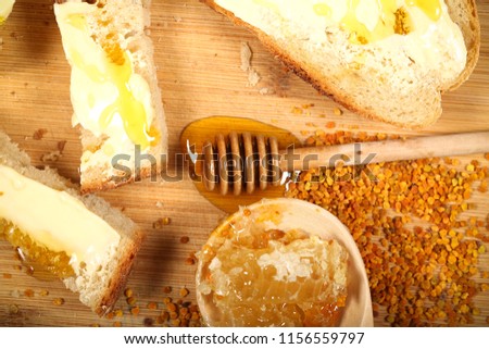 bread with honey sandwich lies on the table