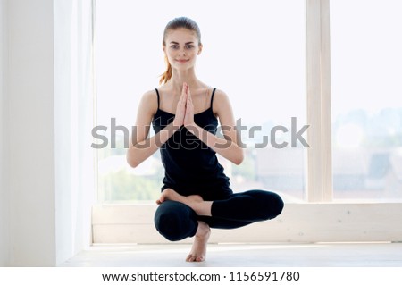 middle-aged woman in front of the chest yoga asana                          