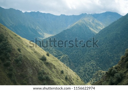 Natural mountains in summer. Beautiful landscape with light tones. A tourist route. A place for hiking and recreation. Nice picture. 