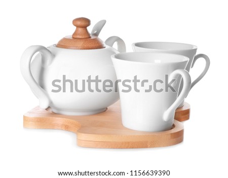 Set of cups with sugar bowl on white background Royalty-Free Stock Photo #1156639390