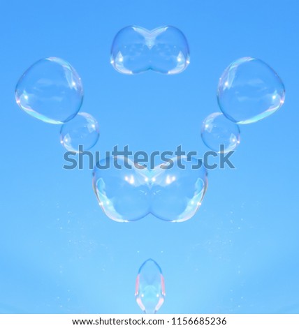 An artistically manipulated, glossy modern bubble design wallpaper/background. 