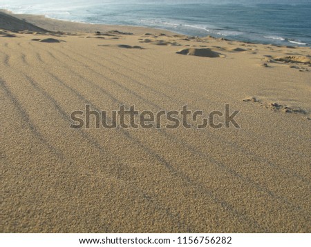 Blue Sky, Brown Sand and Bright Sun