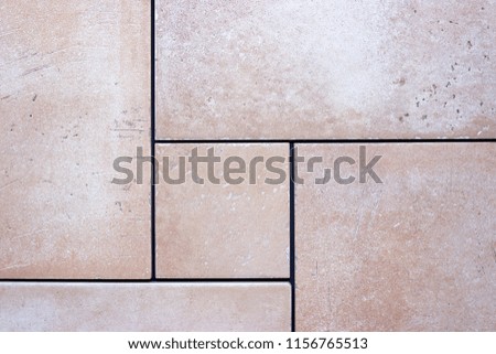 Close up of a surface of ceramic tiles floor; texture background