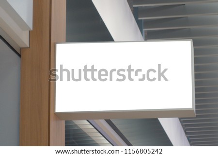 Mock up horizontal rectangular white empty signage of store, shop in shopping mall