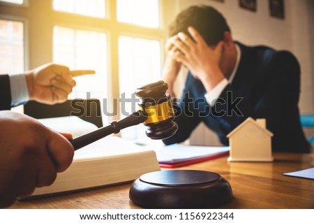 Businessman feels stressed when filed for bankruptcy, bankruptcy and execution concept. Royalty-Free Stock Photo #1156922344