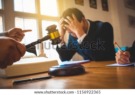 Businessman feels stressed when filed for bankruptcy, bankruptcy and execution concept. Royalty-Free Stock Photo #1156922365