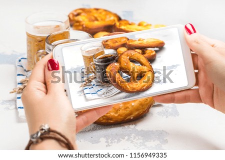 Mobile shot of pretzels and beer
