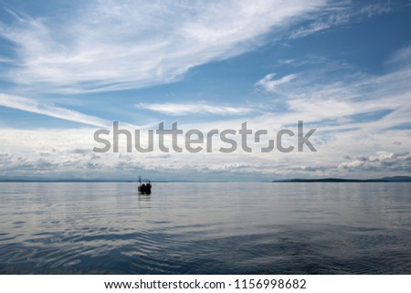 Small fishing boat on the Lake Champlain USA