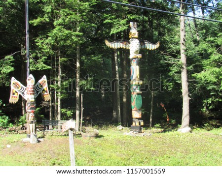 Decorative totem poles seen in Maine