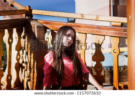 Lovely girl on the deck of a ship