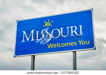 Missouri Welcomes You - a roadside sign at a state border with Illinois