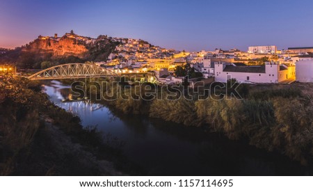 Beautiful photograph of a sunset in Arcos de la Frontera during the blue hour