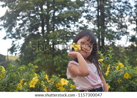 
Girls with yellow flowers