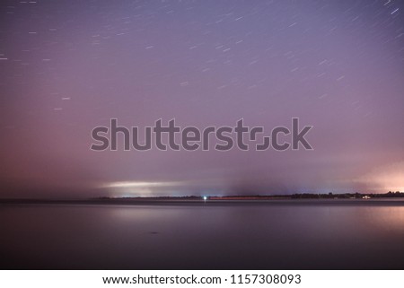 Starry sky above the lake